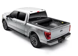 Roll-N-Lock 21-c f150 5.7ft not compatible with oe cargo management tracks e-series