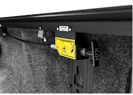 Roll-N-Lock 21-c f150 5.7ft not compatible with oe cargo management tracks e-series