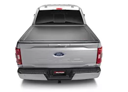 Roll-N-Lock 21-c f150 5.7ft not compatible with oe cargo management tracks e-series