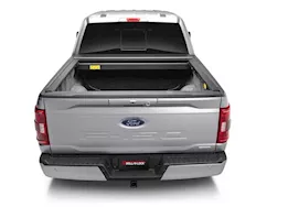 Roll-N-Lock 21-c f150 5.7ft not compatible with oe cargo management tracks e-series