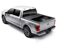 Roll-N-Lock 21-c f150 8 ft not compatible with oe cargo management tracks m-series