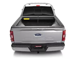 Roll-N-Lock 21-c f150 8 ft not compatible with oe cargo management tracks m-series